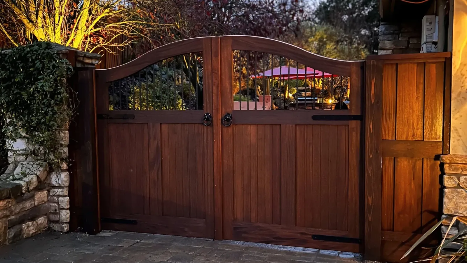 Handcrafted Sapele hardwood entry gate by Heartwood Gates